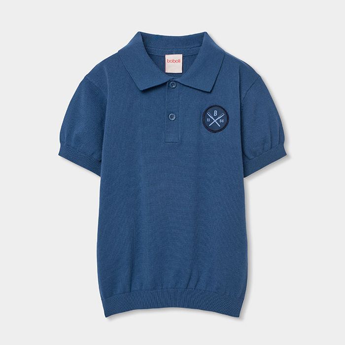 ダークブルーのニットポロ