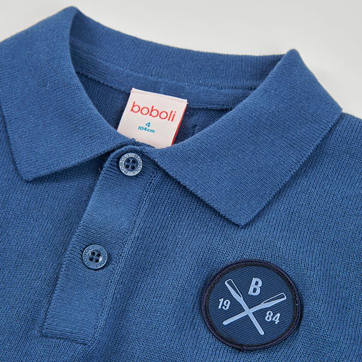 ダークブルーのニットポロ