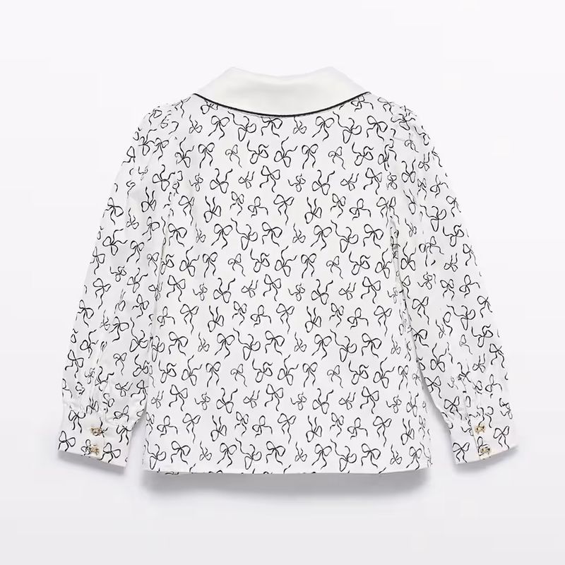 ブラックおリボンいっぱいのブラウス